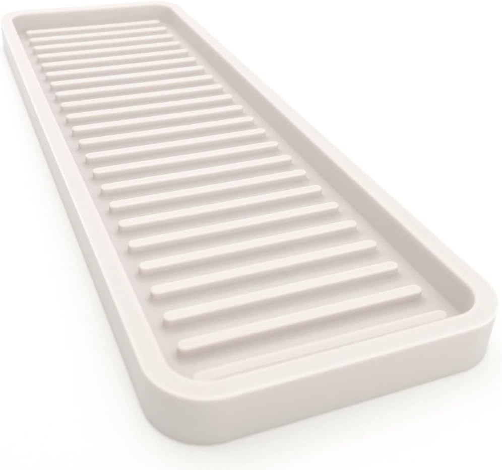 Silicone sink and surface organizer tray, sponge holder, vanity tray, heat safe, dishwasher safe, for bathroom and kitchen organization (vanilla cream, 12" x 4")